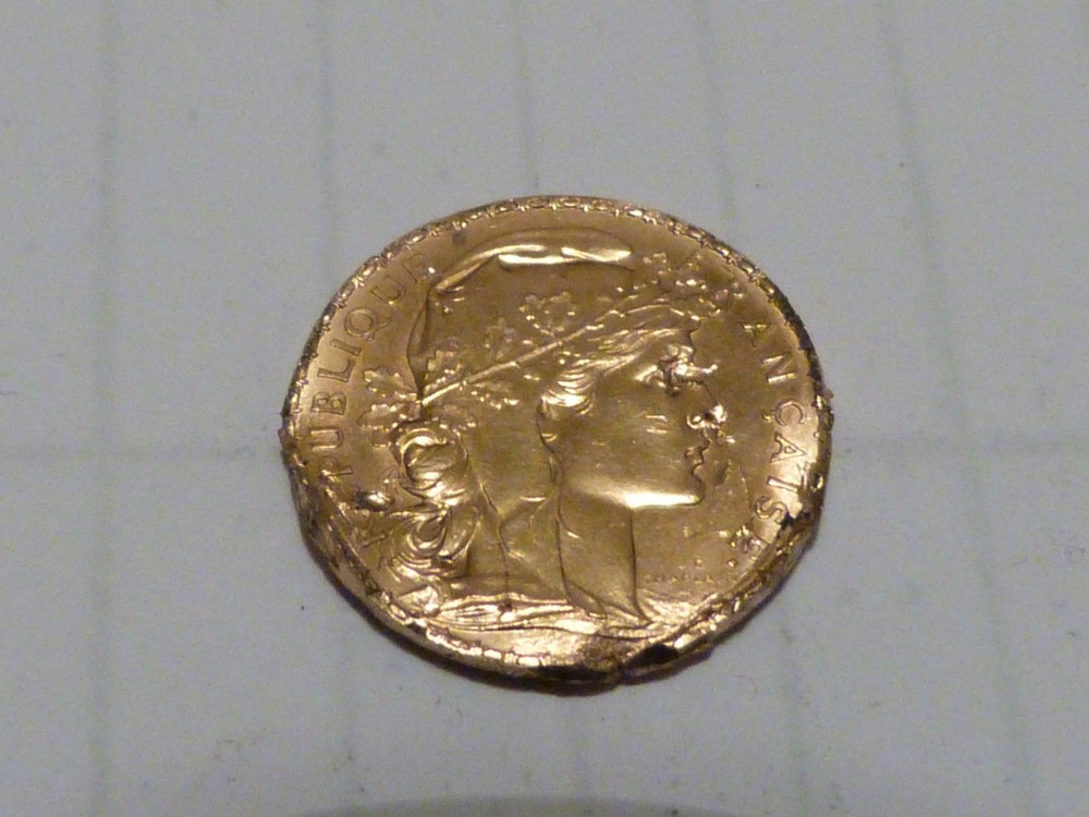 2887 authentique 20 francs or vendu en état il et tordu trouver comme sa..jpg